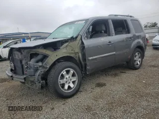 2011 Honda Pilot Touring z VIN 5FNYF4H94BB046303, wystawiony jako Copart lot #58017515 z przebiegiem 118 384 mil mil oraz Szkoda całkowita • Salvage title. Historia ofert i sprzedaży dostępna na DreamBid. Obrazek 1.