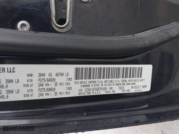 2009 Dodge Ram 1500 SLT with VIN 1D3HV18T69S701854, listed as a IAAI auction lot 41994492 with 185,066 mi miles. Bid and sale history available at carsss.com. Image 9.