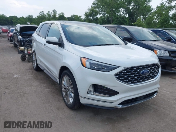 2021 Ford Edge Titanium with VIN 2FMPK4K96MBA18546, listed as a IAAI auction lot 42584326 with 65,214 mi miles and . Bid and sale history available at DreamBid. Image 1.