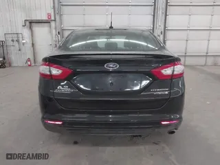 2015 Ford Fusion Titanium Hybrid with VIN 3FA6P0RU2FR309074, listed as a IAAI auction lot 41240630 with 172,025 mi miles. Bid and sale history available at carsss.com. Image 17.