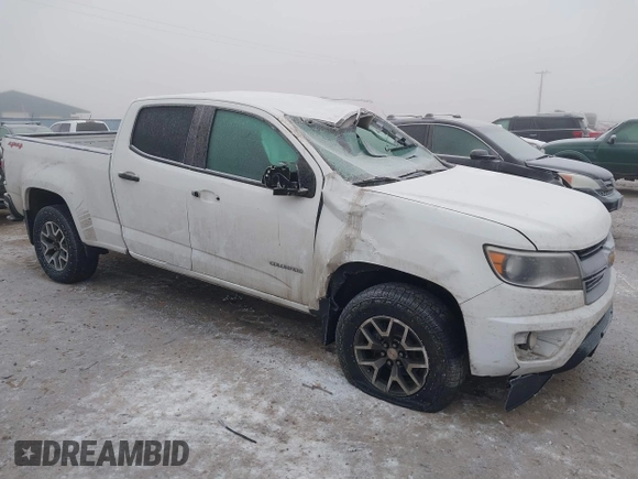 2018 Chevrolet Colorado 4WD Work Truck z VIN 1GCGTBEN3J1271023, wystawiony jako IAAI lot #41013812 z przebiegiem 124 032 mil mil oraz . Historia ofert i sprzedaży dostępna na DreamBid. Obrazek 1.