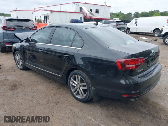 2017 Volkswagen Jetta SEL z VIN 3VWL17AJ1HM406515, wystawiony jako IAAI lot #42660560 z przebiegiem 88 253 mil mil oraz . Historia ofert i sprzedaży dostępna na DreamBid. Obrazek 3.