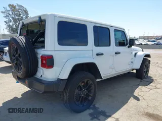 2024 Jeep Wrangler Sahara with VIN 1C4RJXP61RW126904, listed as a IAAI auction lot 41998215 with 32,034 mi miles and . Bid and sale history available at DreamBid. Image 4.