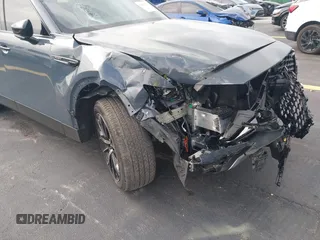 2025 Mazda CX-70 Premium Plus with VIN JM3KJEHA3S1126454, listed as a IAAI auction lot 42427454 with 5,648 mi miles and . Bid and sale history available at DreamBid. Image 6.