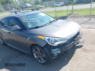 2014 Hyundai Veloster Turbo with VIN KMHTC6AE0EU207064, listed as a IAAI auction lot 42547214 with 103,664 mi miles and . Bid and sale history available at DreamBid. Image 1.