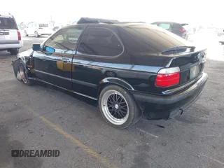 1996 BMW 3-Series 318TI with VIN WBACG8324TAU38424, listed as a IAAI auction lot 41529537 with 160,199 mi miles. Bid and sale history available at carsss.com. Image 3.