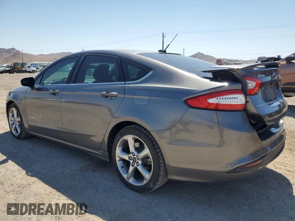 2014 Ford Fusion SE Hybrid with VIN 3FA6P0LU3ER306739, listed as a Copart auction lot 69887454 with 114,150 mi miles and Salvage title. Bid and sale history available at DreamBid. Image 2.