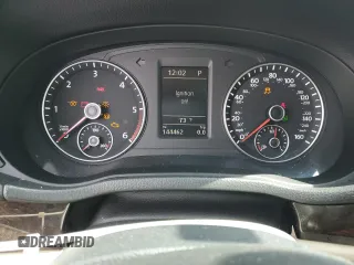 2014 Volkswagen Passat SEL Premium z VIN 1VWCN7A36EC077099, wystawiony jako Copart lot #58440905 z przebiegiem 144 462 mil mil oraz Szkoda całkowita • Salvage title. Historia ofert i sprzedaży dostępna na DreamBid. Obrazek 9.
