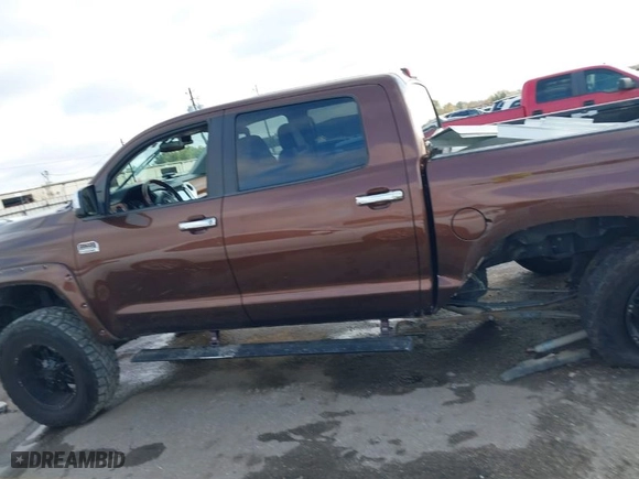 2014 Toyota Tundra 4WD Truck Platinum with VIN 5TFAW5F18EX411578, listed as a IAAI auction lot 41108462 with 150,873 mi miles. Bid and sale history available at carsss.com. Image 14.