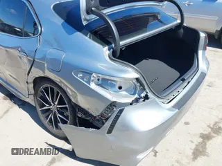 2023 Toyota Camry SE z VIN 4T1T11AK0PU833313, wystawiony jako IAAI lot #41743288 z przebiegiem 25 195 mil mil oraz . Historia ofert i sprzedaży dostępna na DreamBid. Obrazek 6.