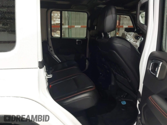 2021 Jeep Wrangler Unlimited Rubicon with VIN 1C4HJXFN2MW809904, listed as a IAAI auction lot 41567956 with 34,000 mi miles and . Bid and sale history available at DreamBid. Image 8.