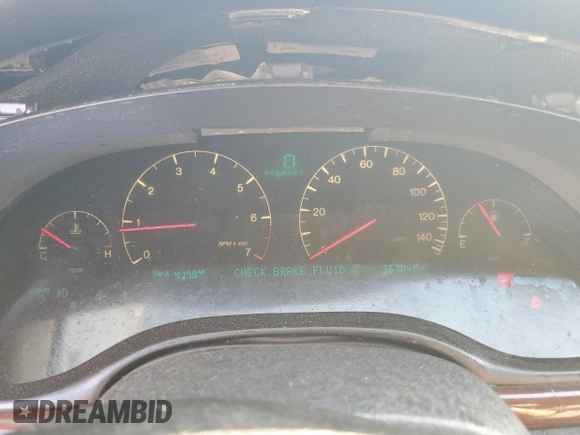 2000 Cadillac Seville Touring STS z VIN 1G6KY5497YU345038, wystawiony jako Copart lot #74315354 z przebiegiem 96 704 mil mil oraz Nie do naprawy • Non repairable. Historia ofert i sprzedaży dostępna na DreamBid. Obrazek 9.