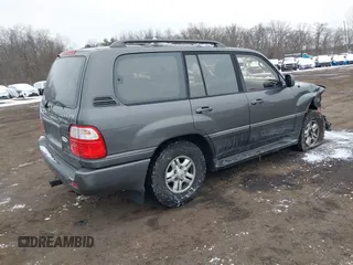 2000 Lexus LX 470 with VIN JT6HT00W9Y0096647, listed as a IAAI auction lot 41376347 with 231,916 mi miles and . Bid and sale history available at DreamBid. Image 4.