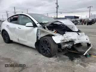 2023 Tesla Model Y Long Range z VIN 7SAYGDEE9PA070232, wystawiony jako Copart lot #55881805 z przebiegiem 38 276 mil mil oraz Szkoda całkowita • Salvage title. Historia ofert i sprzedaży dostępna na DreamBid. Obrazek 4.