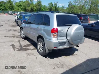 2003 Toyota RAV4 with VIN JTEGH20V030084397, listed as a IAAI auction lot 42157202 with 117,215 mi miles and . Bid and sale history available at DreamBid. Image 3.