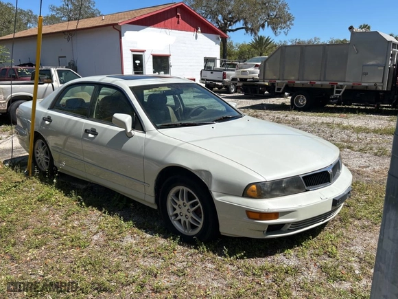 2000 Mitsubishi Diamante LS with VIN 6MMAP67P4YT001142, listed as a Copart auction lot 49667135 with 243,861 mi miles and Clean Title. Bid and sale history available at carsss.com. Image 1.