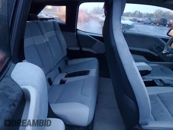 2015 BMW i3 z VIN WBY1Z2C55FV286998, wystawiony jako Copart lot #80995244 z przebiegiem Nie podano mil oraz Szkoda całkowita • Salvage title. Historia ofert i sprzedaży dostępna na DreamBid. Obrazek 10.