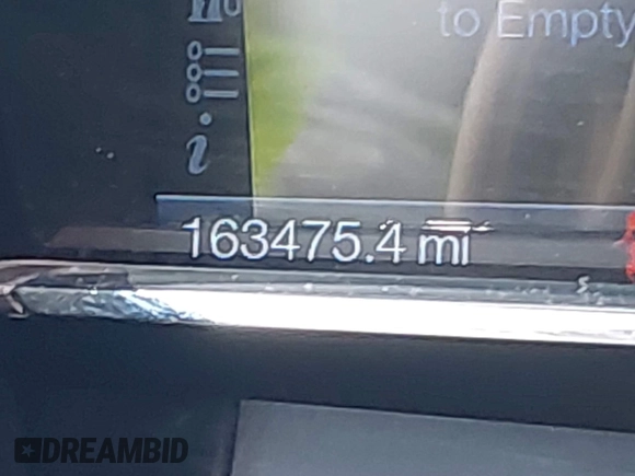 2013 Lincoln MKS with VIN 1LNHL9DK2DG606838, listed as a IAAI auction lot 42454441 with 163,475 mi miles and . Bid and sale history available at DreamBid. Image 12.