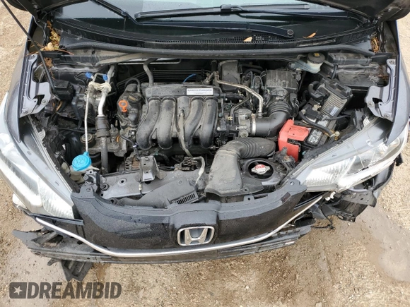 2015 Honda Fit EX-L z VIN 3HGGK5H85FM763929, wystawiony jako Copart lot #60808125 z przebiegiem 79 441 mil mil oraz Szkoda całkowita • Salvage title. Historia ofert i sprzedaży dostępna na DreamBid. Obrazek 11.