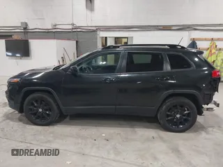 2014 Jeep Cherokee Latitude with VIN 1C4PJMCS6EW299532, listed as a IAAI auction lot 41833888 with 199,915 mi miles and . Bid and sale history available at DreamBid. Image 14.