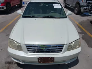 2002 Kia Optima LX z VIN KNAGD126325144218, wystawiony jako IAAI lot #42596691 z przebiegiem 220 972 mil mil oraz . Historia ofert i sprzedaży dostępna na DreamBid. Obrazek 6.