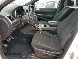 2021 Jeep Grand Cherokee Laredo X with VIN 1C4RJEAG0MC813825, listed as a Copart auction lot 59191185 with 65,888 mi miles and Salvage title. Bid and sale history available at DreamBid. Image 7.