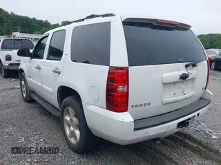 2007 Chevrolet Tahoe LT with VIN 1GNFC13007R415013, listed as a IAAI auction lot 42370633 with 302,992 mi miles and . Bid and sale history available at DreamBid. Image 3.