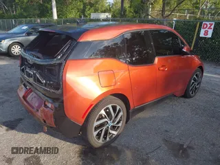 2014 BMW i3 z VIN WBY1Z2C50EV283795, wystawiony jako IAAI lot #42311864 z przebiegiem 41 277 mil mil oraz . Historia ofert i sprzedaży dostępna na DreamBid. Obrazek 4.