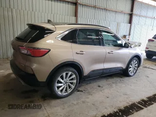 2021 Ford Escape Titanium with VIN 1FMCU9J90MUB15582, listed as a Copart auction lot 50982955 with 27,041 mi miles and Salvage Title. Bid and sale history available at carsss.com. Image 3.