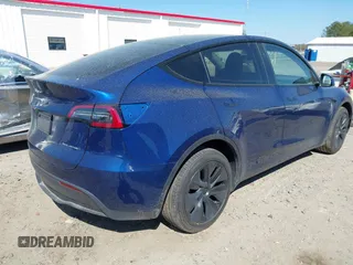 2024 Tesla Model Y Long Range with VIN 7SAYGDEE5RA329172, listed as a IAAI auction lot 41892147 with 8,030 mi miles and . Bid and sale history available at DreamBid. Image 4.