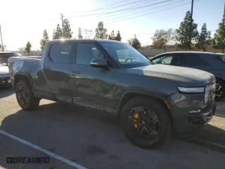 2022 Rivian R1T Launch Edition with VIN 7FCTGAAL3NN003101, listed as a Copart auction lot 85602634 with 17,189 mi miles and Salvage Title. Bid and sale history available at carsss.com. Image 4.