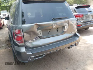 2007 Honda Pilot EX-L z VIN 5FNYF18507B003645, wystawiony jako IAAI lot #42420748 z przebiegiem 219 220 mil mil oraz . Historia ofert i sprzedaży dostępna na DreamBid. Obrazek 6.