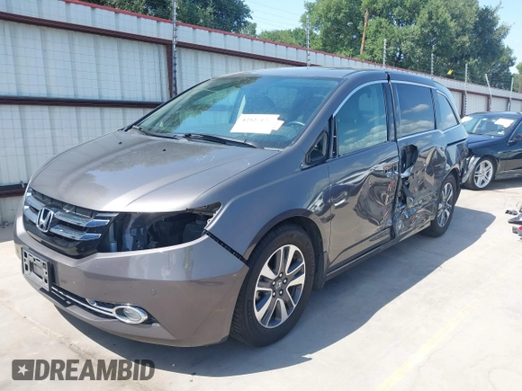 2014 Honda Odyssey Touring with VIN 5FNRL5H99EB075979, listed as a IAAI auction lot 42520154 with 99,314 mi miles and . Bid and sale history available at DreamBid. Image 21.