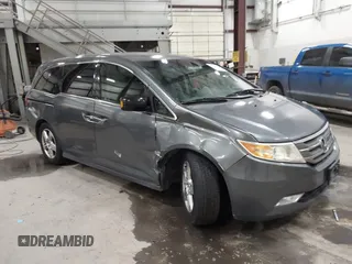 2011 Honda Odyssey Touring с VIN 5FNRL5H97BB027330, выставлен на аукционе IAAI как лот 41092042 с пробегом 188 824 миль миль и . История ставок и продаж доступна на DreamBid. Изображение 1.
