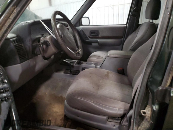 1997 Jeep Cherokee Country with VIN 1J4FJ78S8VL577137, listed as a Copart auction lot 48034405 with 156,154 mi miles and Salvage Title. Bid and sale history available at carsss.com. Image 7.