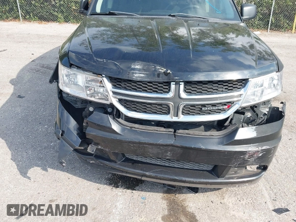 2013 Dodge Journey SE with VIN 3C4PDCAB0DT710609, listed as a IAAI auction lot 41763431 with 145,851 mi miles and . Bid and sale history available at DreamBid. Image 6.