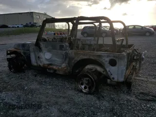 2004 Jeep Wrangler Rubicon with VIN 1J4FA69S54P710341, listed as a Copart auction lot 51749175 with Not provided miles and Non repairable. Bid and sale history available at DreamBid. Image 2.