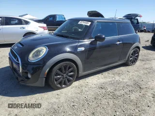 2014 MINI Hardtop S with VIN WMWXM7C5XET970654, listed as a Copart auction lot 49744485 with 111,730 mi miles and Salvage Title. Bid and sale history available at DreamBid. Image 1.