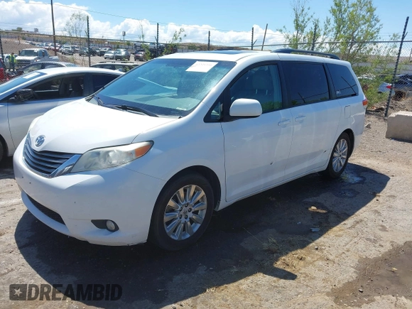 2011 Toyota Sienna XLE with VIN 5TDDK3DCXBS029961, listed as a IAAI auction lot 42228356 with 251,571 mi miles and . Bid and sale history available at DreamBid. Image 2.
