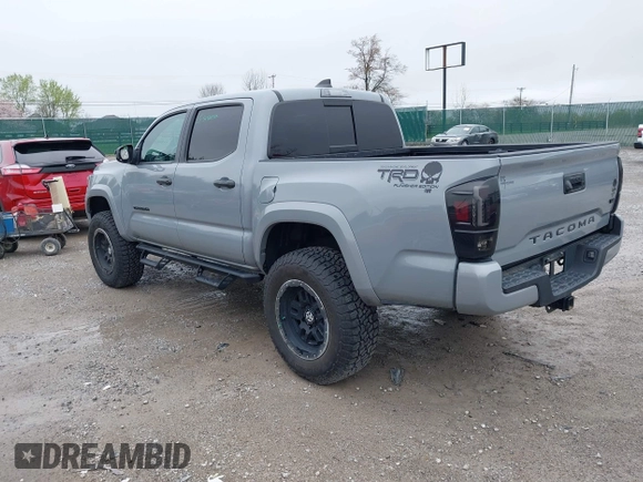 2021 Toyota Tacoma SR z VIN 3TMCZ5AN5MM372821, wystawiony jako IAAI lot #41886586 z przebiegiem 68 878 mil mil oraz . Historia ofert i sprzedaży dostępna na DreamBid. Obrazek 3.