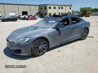 2017 Tesla Model S 100D with VIN 5YJSA1E21HF207452, listed as a Copart auction lot 52406355 with Not provided miles and Salvage title. Bid and sale history available at DreamBid. Image 1.