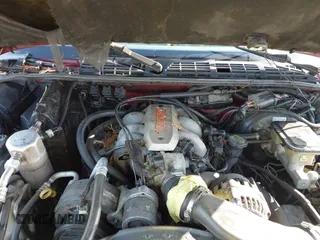 1995 GMC Jimmy SLE z VIN 1GKDT13W1SK528155, wystawiony jako IAAI lot #42177589 z przebiegiem 283 900 mil mil oraz . Historia ofert i sprzedaży dostępna na DreamBid. Obrazek 10.