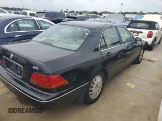 1998 Acura RL Premium with VIN JH4KA9656WC001298, listed as a Copart auction lot 73740154 with 108,066 mi miles and Salvage Title. Bid and sale history available at carsss.com. Image 3.
