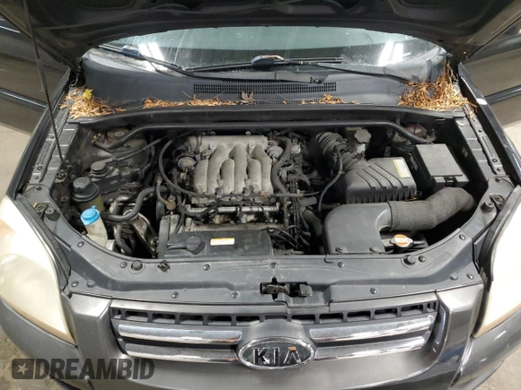 2005 Kia Sportage LX with VIN KNDJF723557033271, listed as a Copart auction lot 84699134 with 182,798 mi miles and Non Repairable. Bid and sale history available at carsss.com. Image 14.