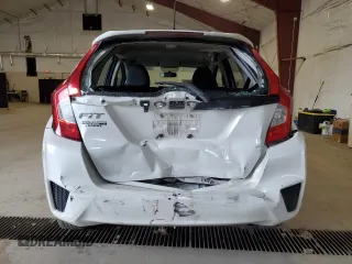 2017 Honda Fit LX z VIN 3HGGK5H54HM703696, wystawiony jako Copart lot #50496465 z przebiegiem 105 801 mil mil oraz Szkoda całkowita • Salvage title. Historia ofert i sprzedaży dostępna na DreamBid. Obrazek 6.