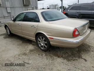 2004 Jaguar XJ with VIN SAJEA74C84SG03857, listed as a Copart auction lot 62156875 with 92,649 mi miles and Salvage title. Bid and sale history available at DreamBid. Image 2.