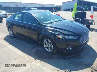 2015 Ford Fusion Energi Titanium with VIN 3FA6P0SUXFR274665, listed as a IAAI auction lot 41769998 with 86,219 mi miles. Bid and sale history available at carsss.com. Image 1.