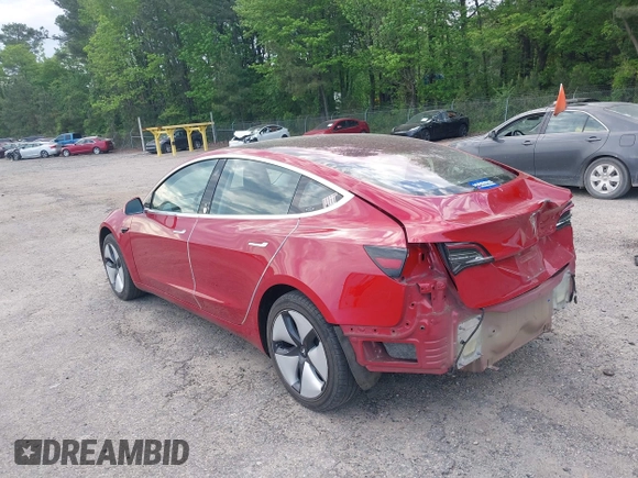 2018 Tesla Model 3 Long Range Battery z VIN 5YJ3E1EA9JF025942, wystawiony jako IAAI lot #42122703 z przebiegiem 84 453 mil mil oraz . Historia ofert i sprzedaży dostępna na DreamBid. Obrazek 3.