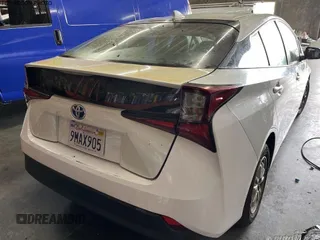 2019 Toyota Prius L Eco z VIN JTDKARFU1K3071925, wystawiony jako IAAI lot #42287457 z przebiegiem 99 671 mil mil oraz . Historia ofert i sprzedaży dostępna na DreamBid. Obrazek 1.