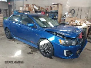 2017 Mitsubishi Lancer ES with VIN JA32V2FW4HU006890, listed as a IAAI auction lot 41636035 with 165,077 mi miles. Bid and sale history available at carsss.com. Image 1.